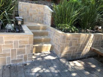 Liquid Stone on walls and steps in paver-like design