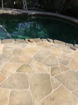 Flagstone design around pool 